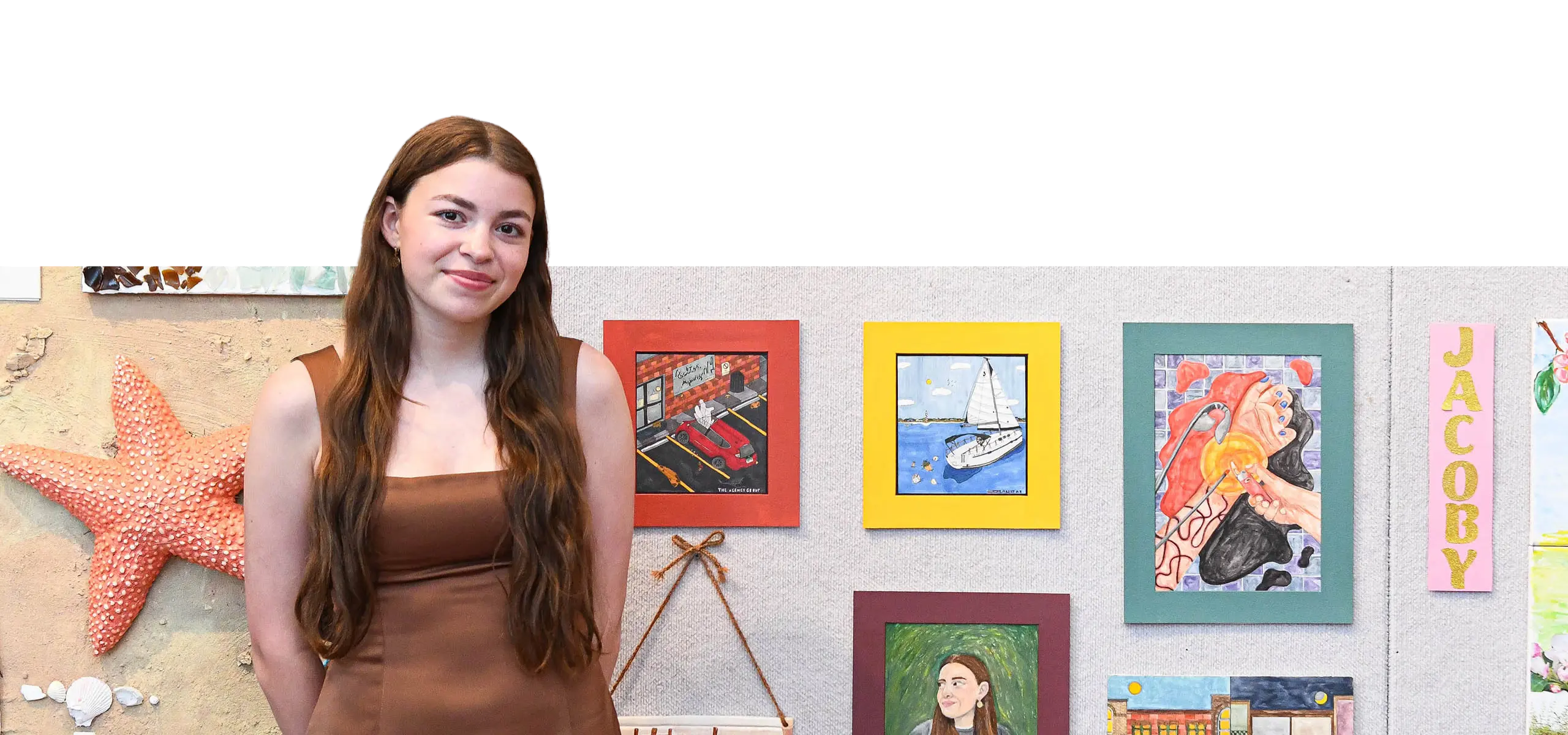 Student in front of artwork