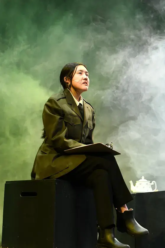 Student performing in play