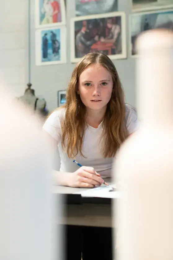 Student in art class