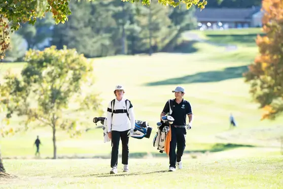 Students playing golf