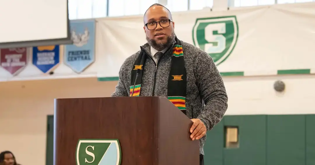 Teacher giving black history month speech