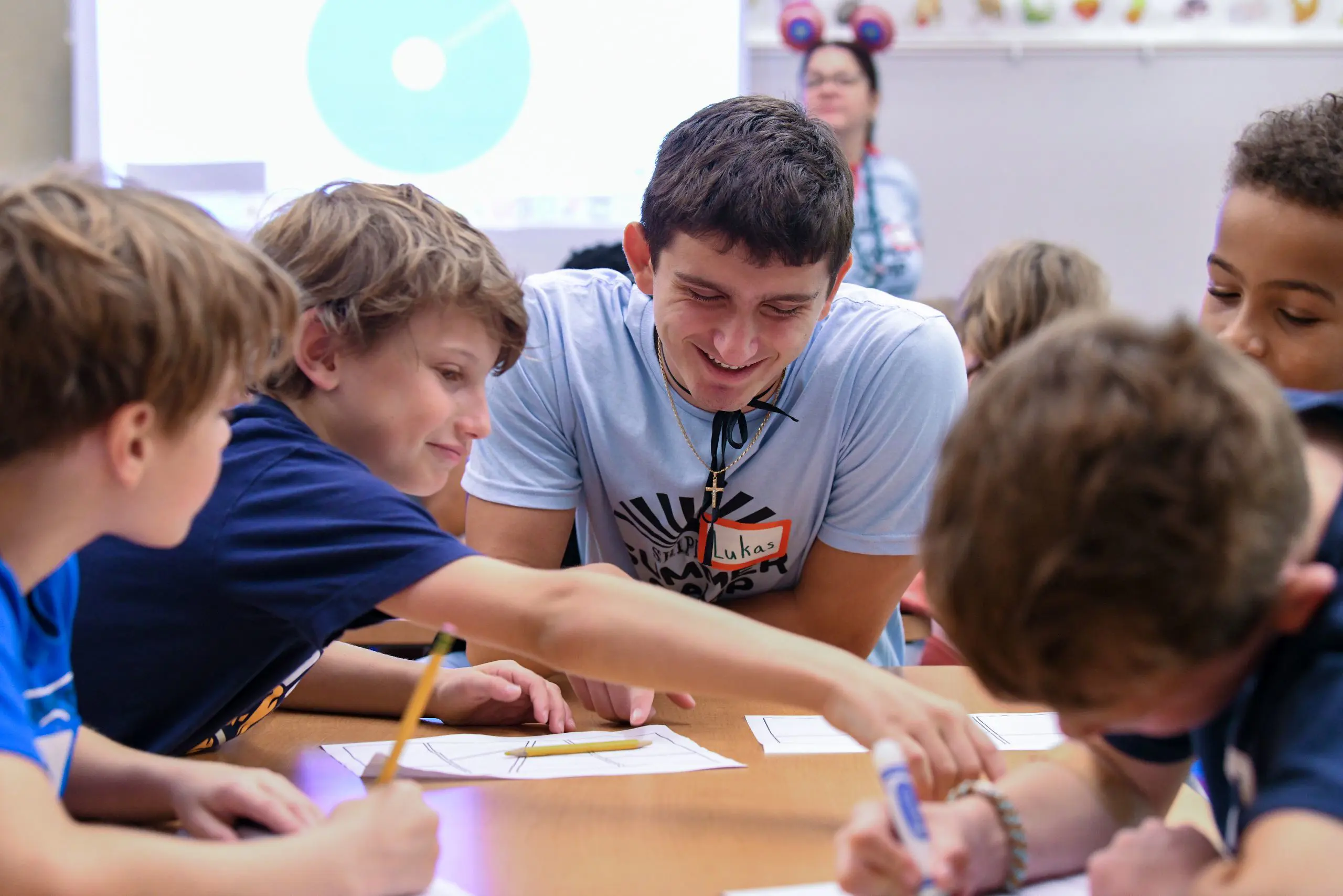 Male students at camp doing activity