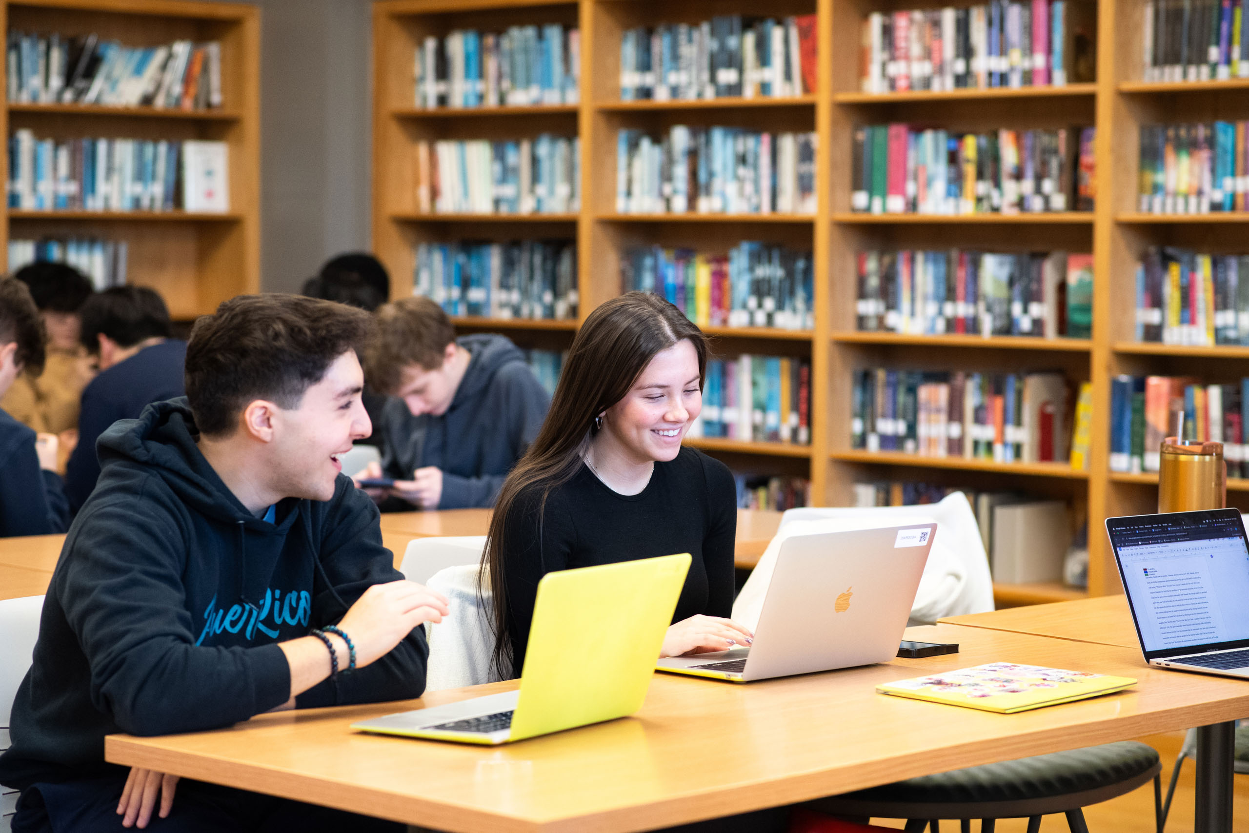 Students working together in library