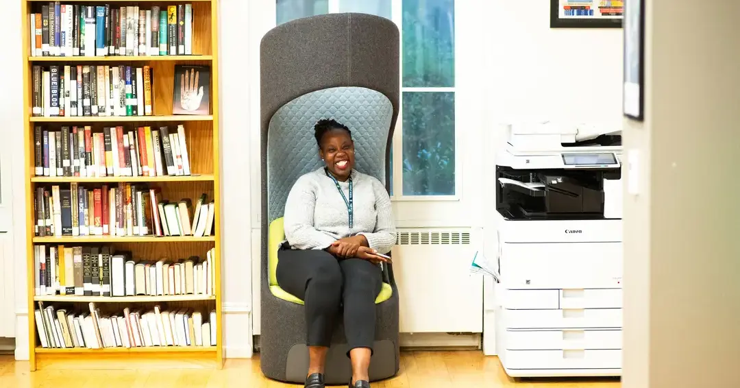 Teacher in library