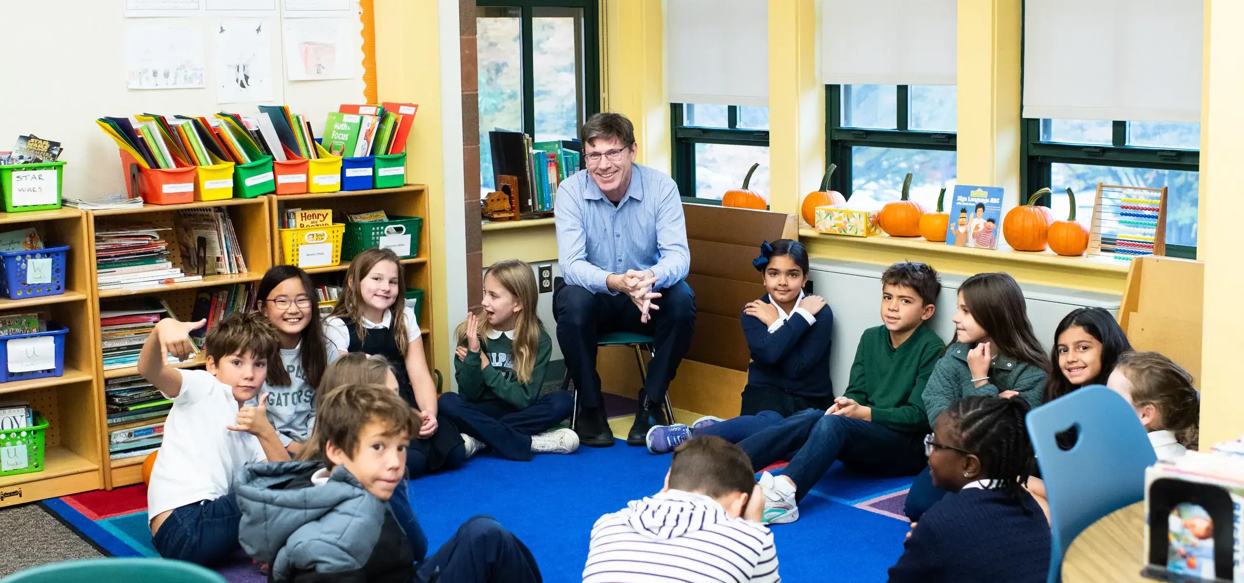 Lower school students in class with teacher