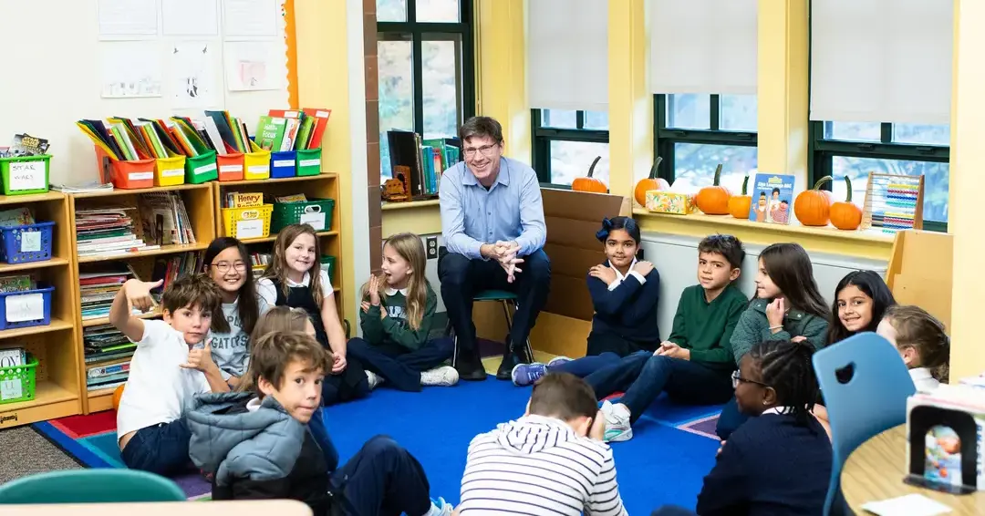 Teacher with students in lower school class