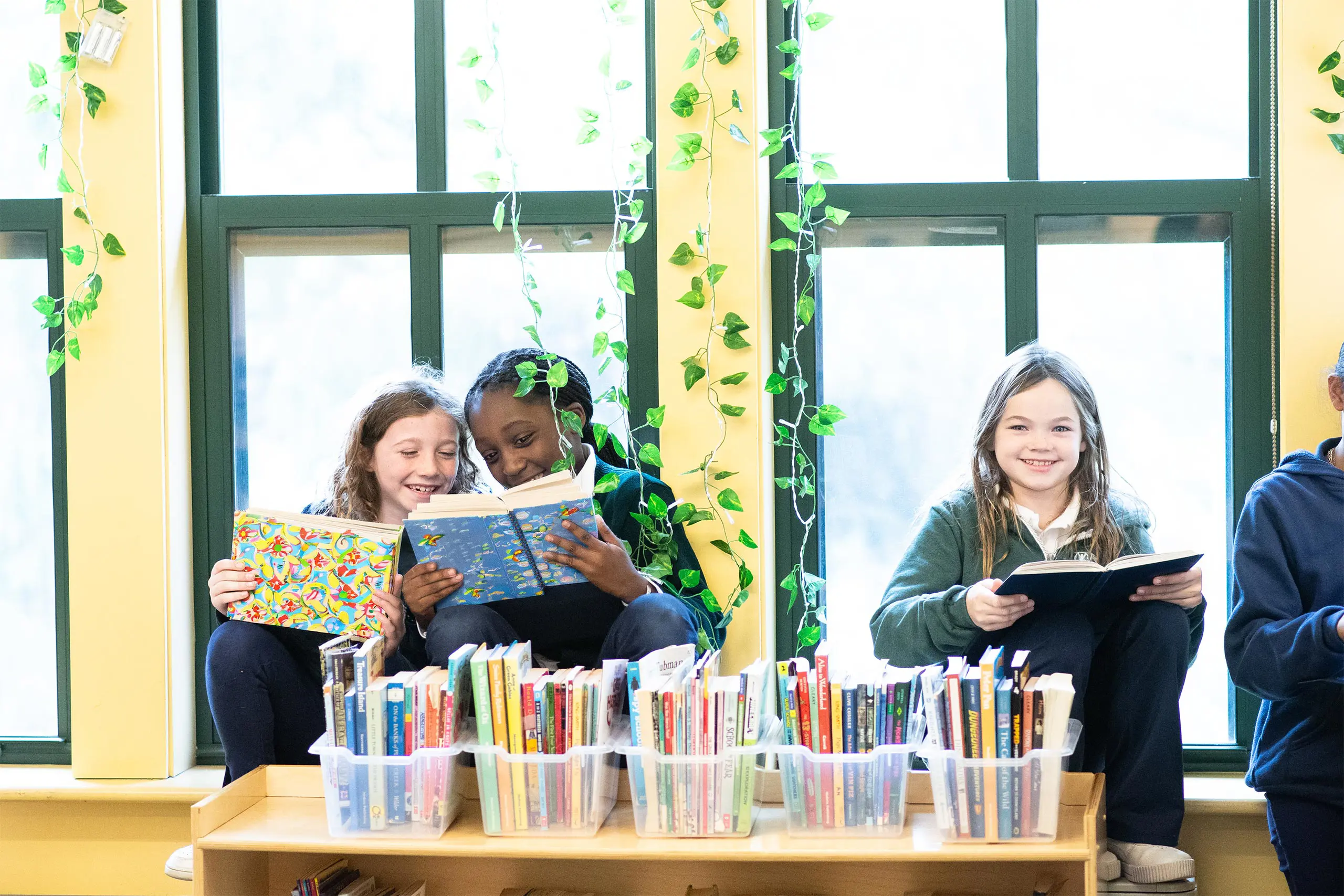 Students reading in library together