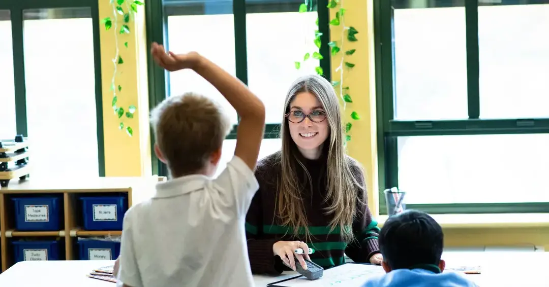 Teacher instructing students in class