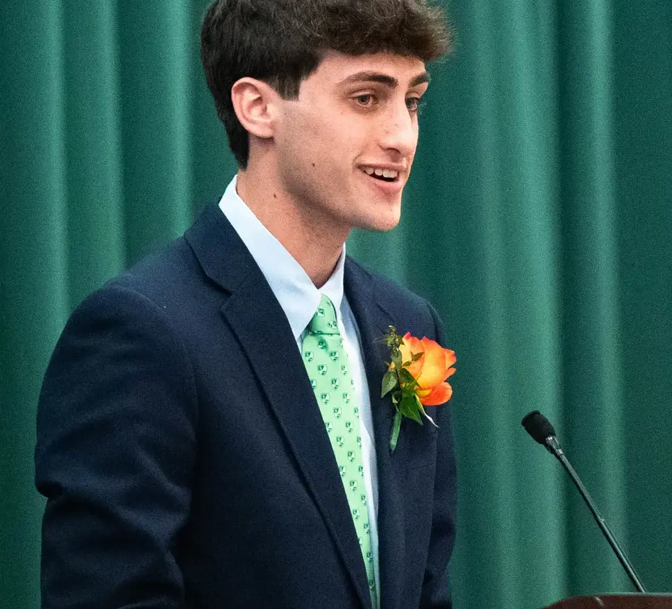 Student speaking at podium