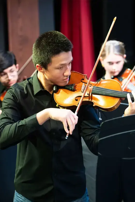 Student playing violin