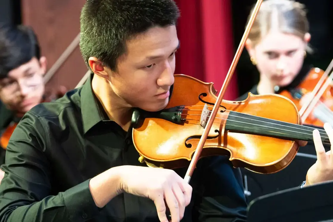 Student playing violin