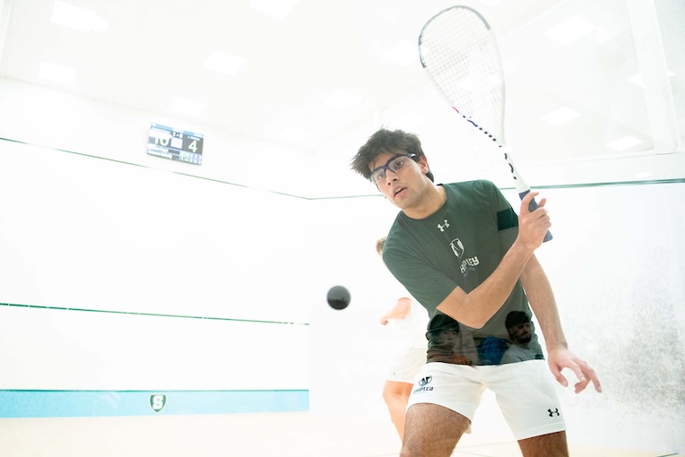 boy playing squash in The Shipley School's Squash Academy