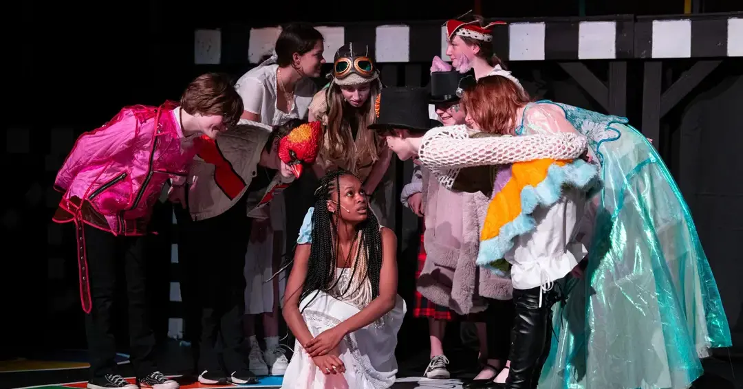 Students performing in play