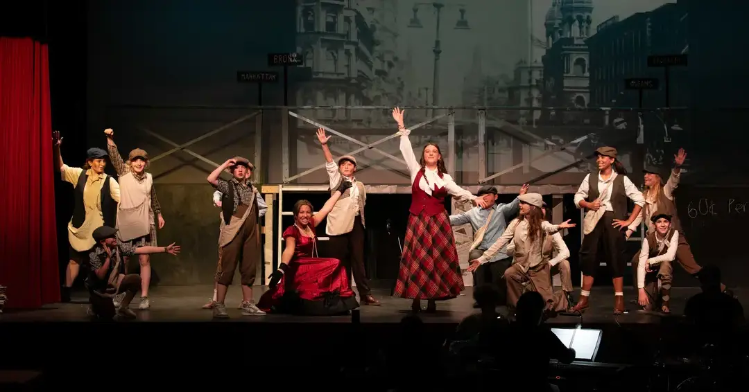 Students performing in play