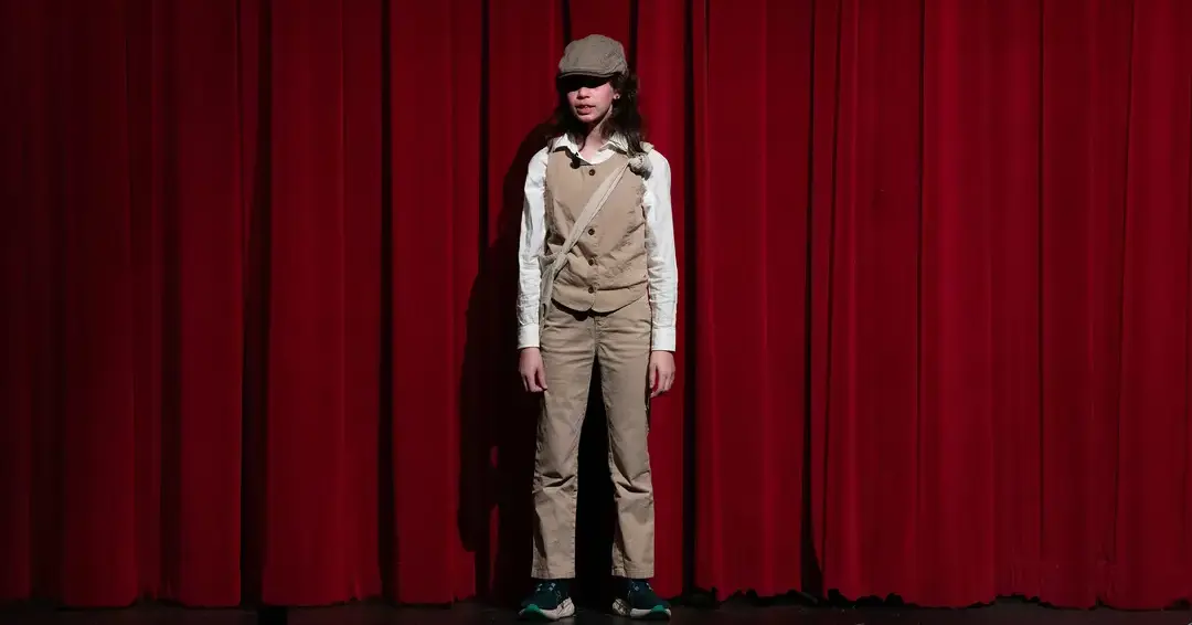 Students performing in play