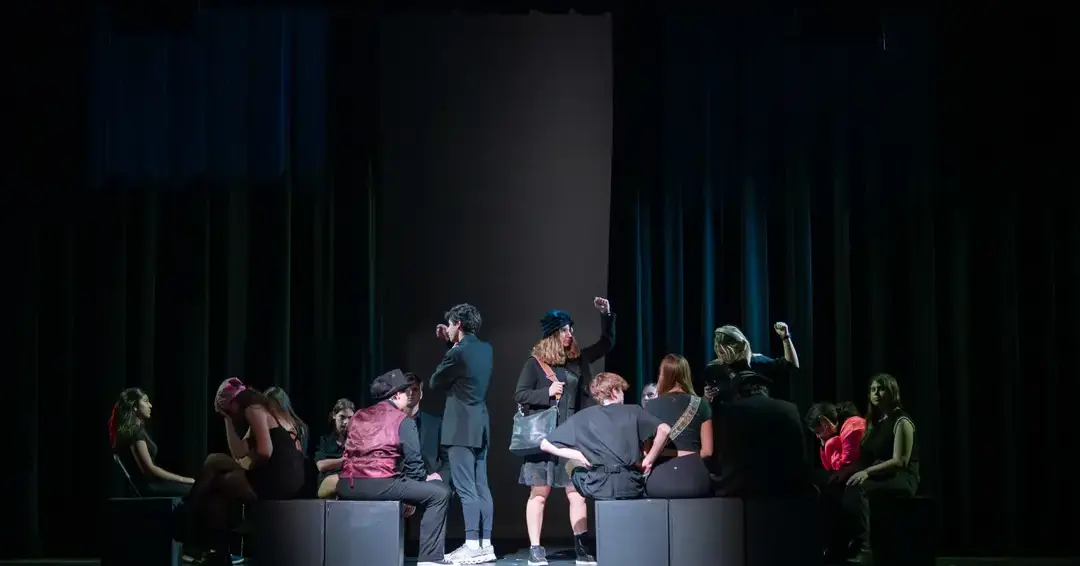 Students performing in play