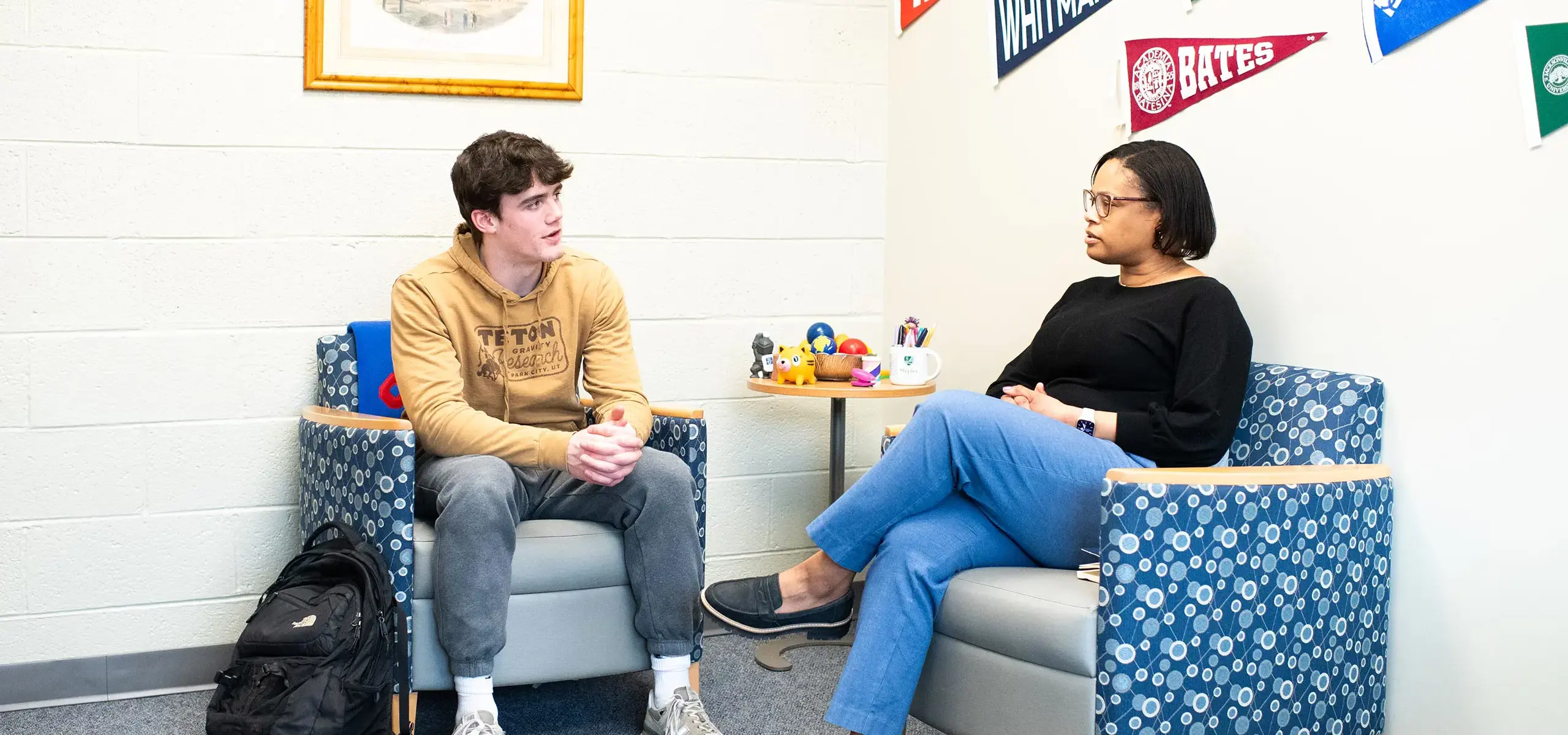College counselor with student