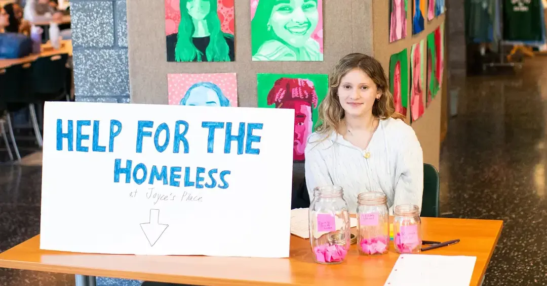 Student at help the homeless service event