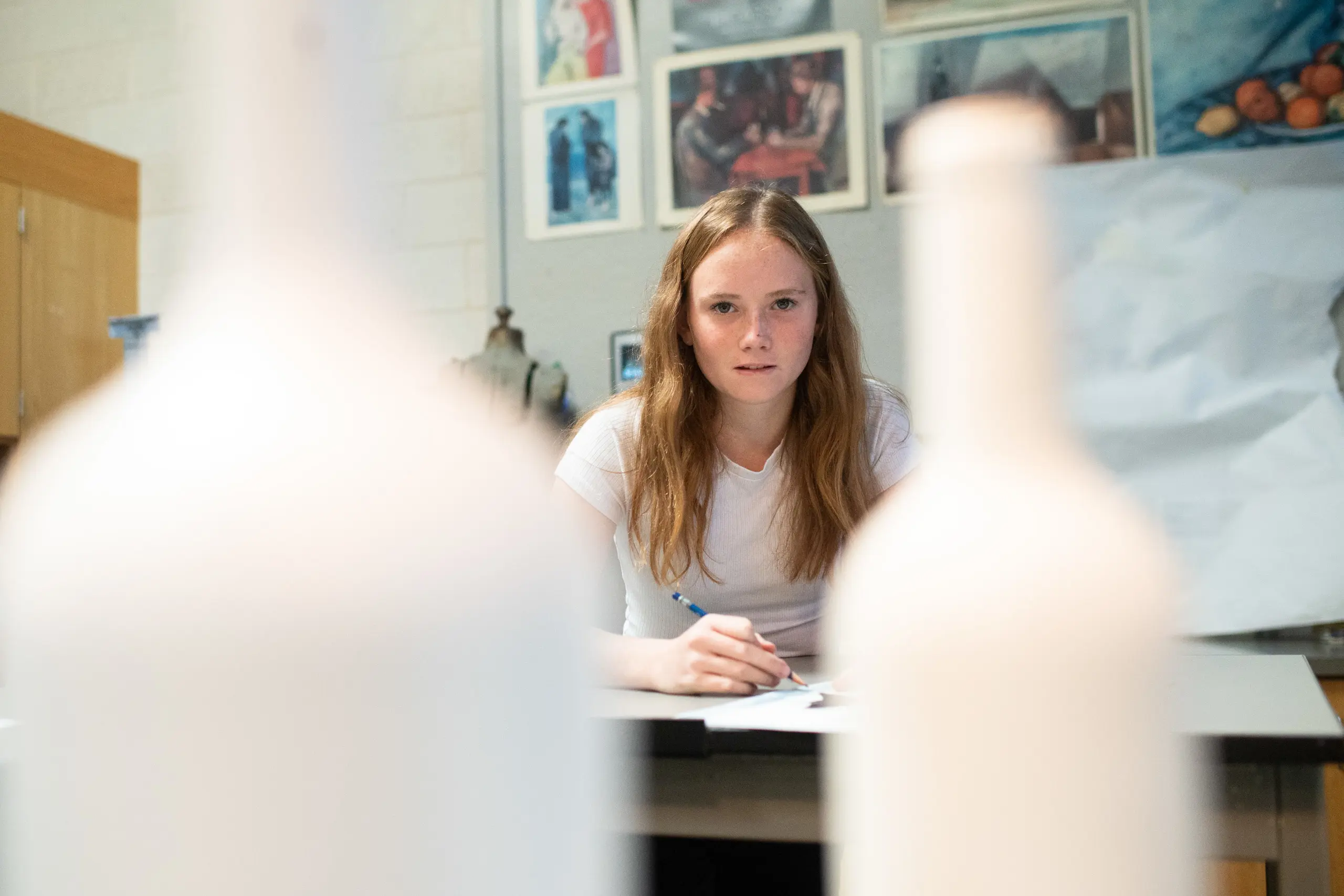 Upper school student in art class