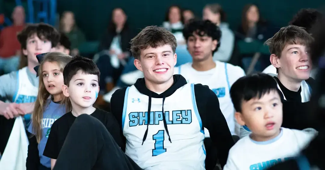 Students watching sports match