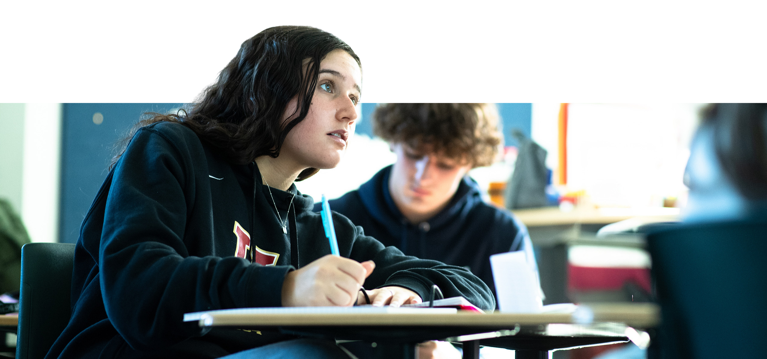 Student listening closely in class
