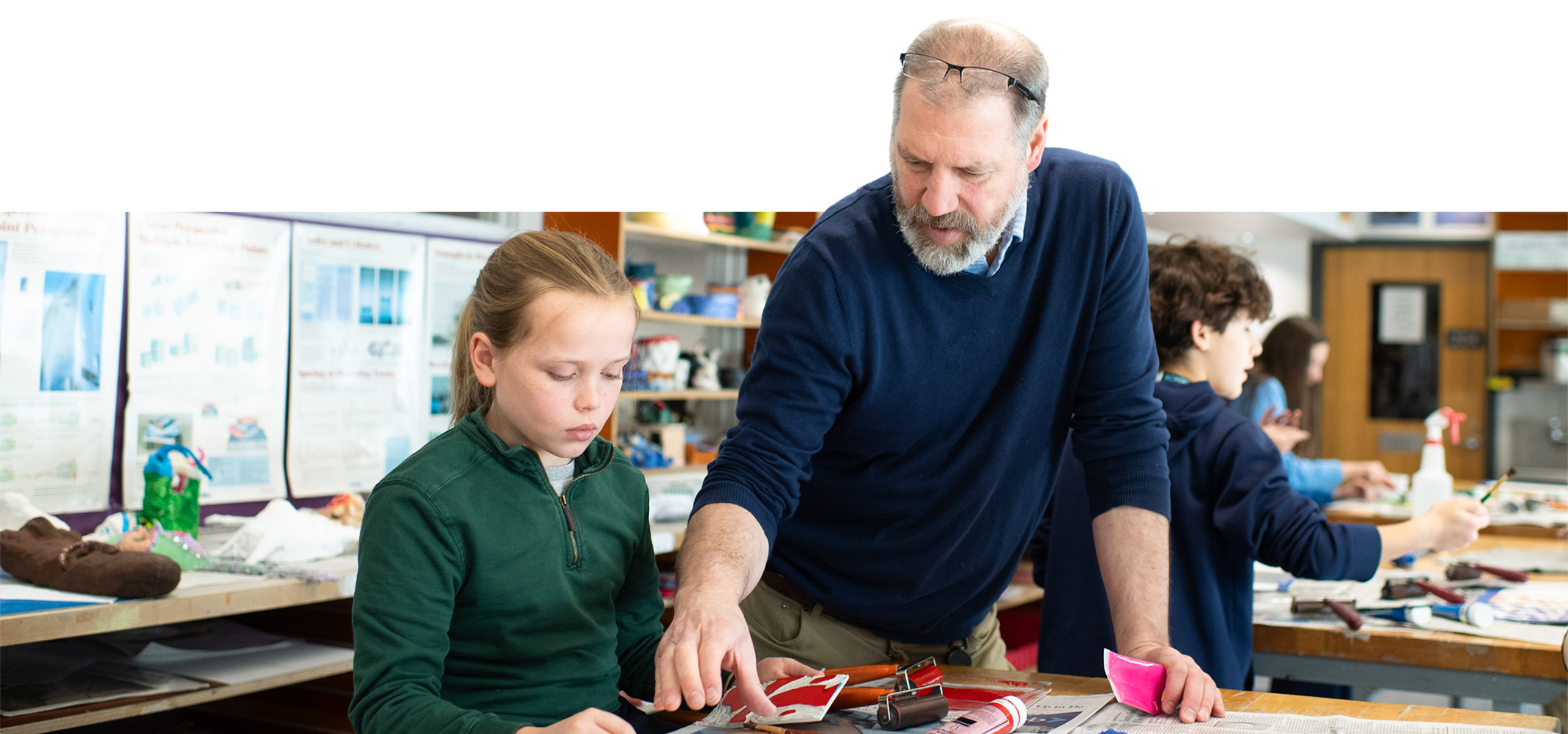 Student and teacher in art class