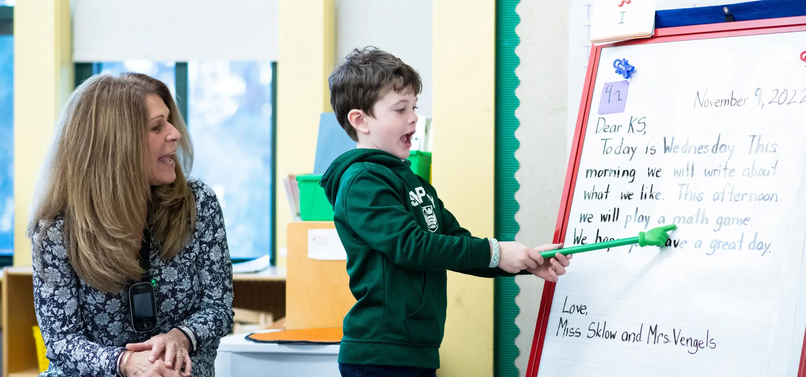 Lower school student and teacher in class