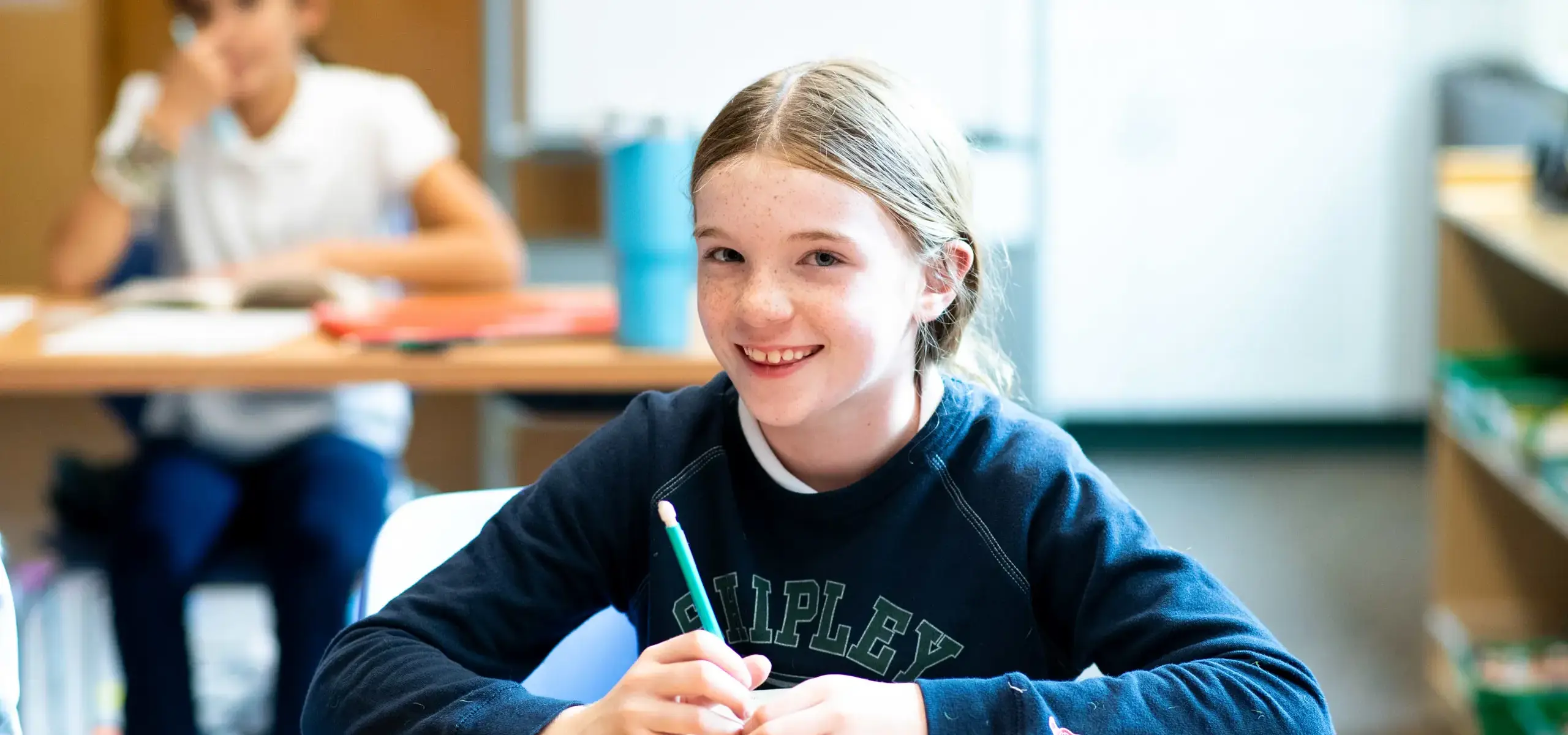 Student smiling in class