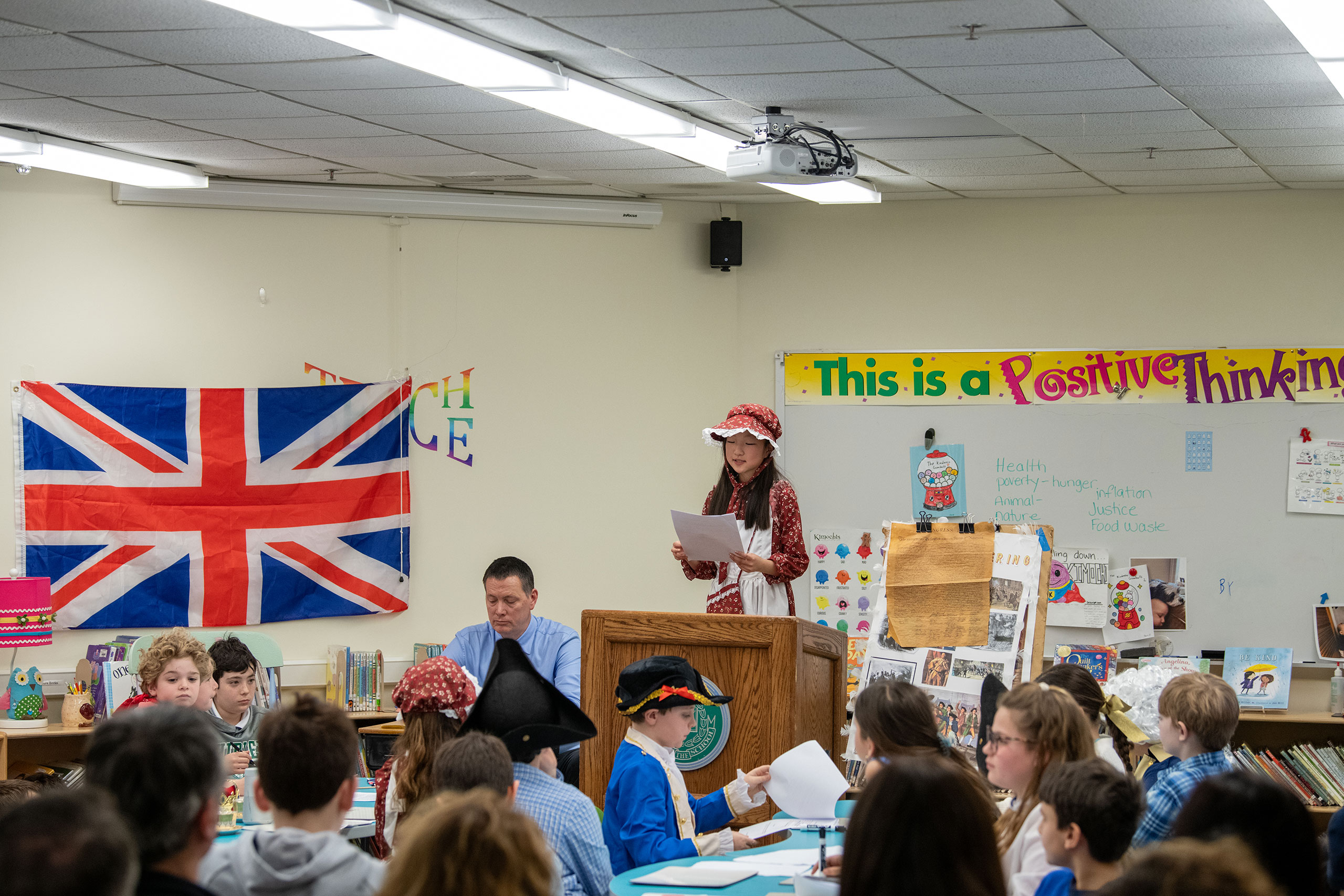 Student in historical costume giving presentation