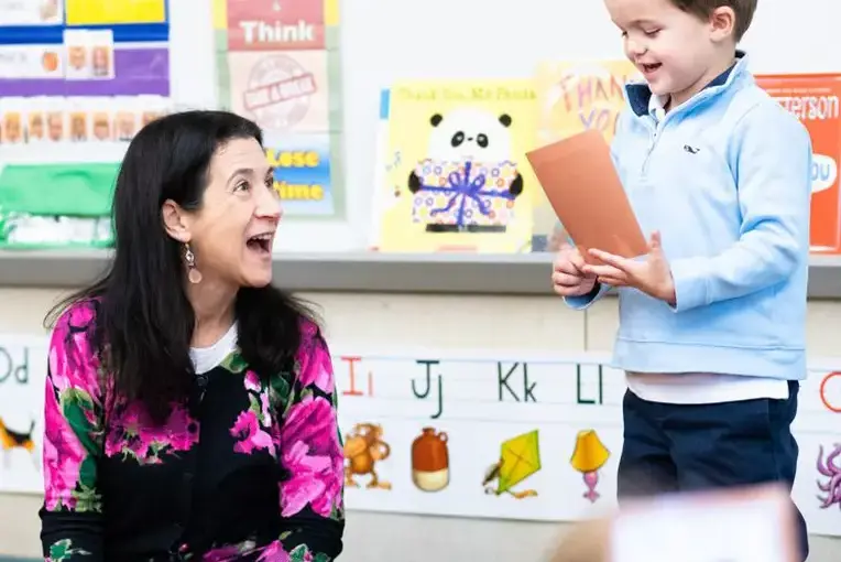 Student and teacher in class
