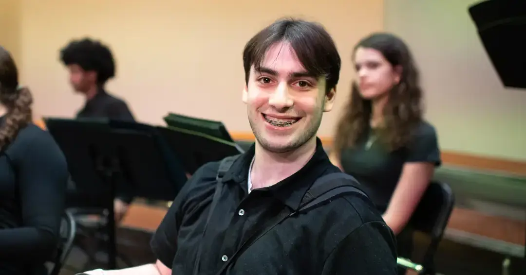 Student smiling in class