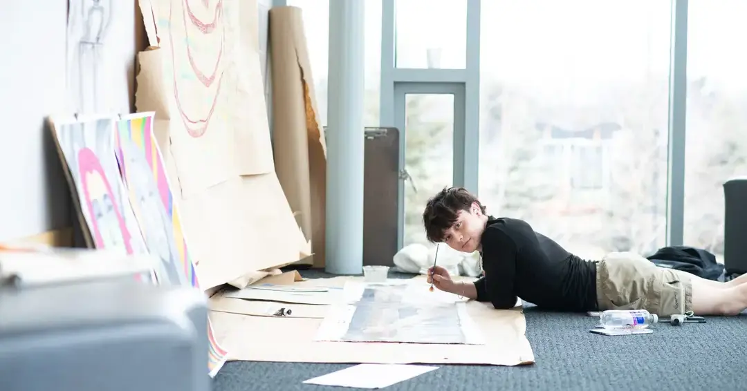 Student wokring on art project