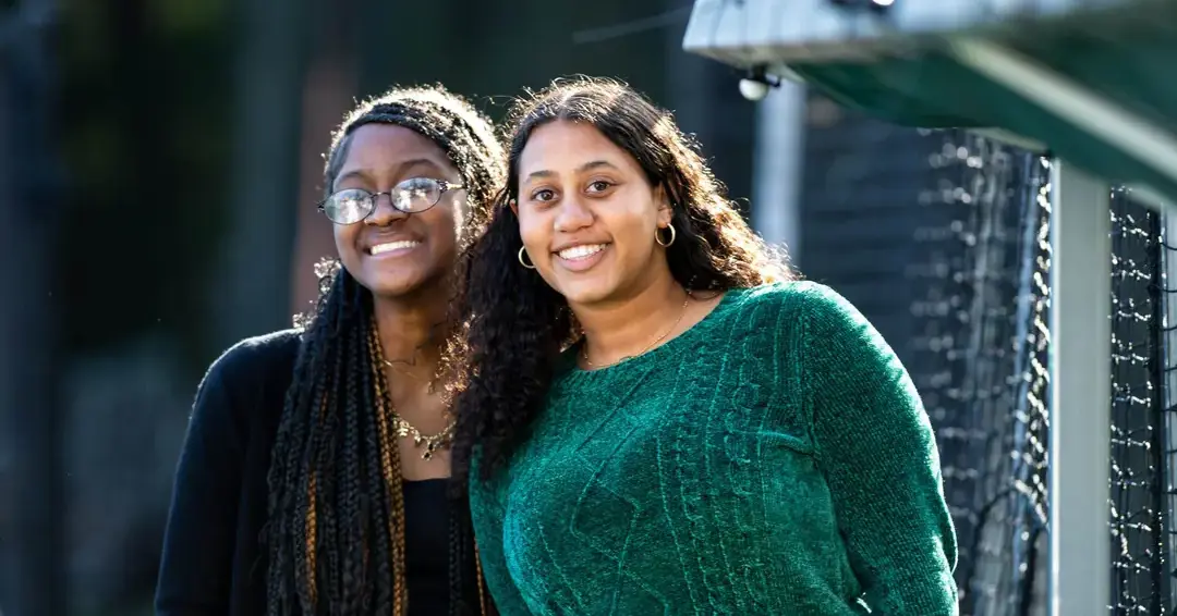 Two students outside together 